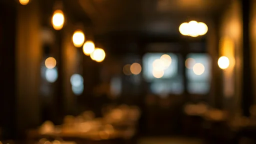 Dark moody restaurant atmosphere with blurred lights
